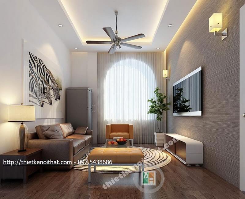 Sửa dụng tranh treo tường và giấy dán tường màu xám cho phòng khách giúp bức tường không còn bị thô cứng mà lại tạo được điểm nhấn cho căn phòng Giấy dán tường trơn tại hải phòng