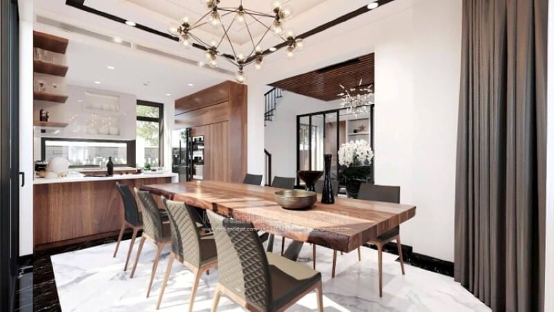 Sẽ là một gợi ý độc đáo với sự hiện hữu tủ bếp gỗ óc chó veneer trầm ấm kết hợp gam màu trắng sáng, long lanh từ tủ bếp trên gỗ An Cường acrylic và mặt bàn bếp đá nhân tạo LG. Sự tương phản giữa 2 sắc màu sẽ là ý tưởng tuyệt vời cho bố trí nội thất phòng bếp hiện đại cho không gian nhà phố, biệt thự.