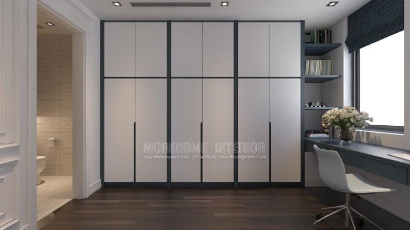 Một sự tích hợp kỳ diệu giữa tủ quần áo hiện đại với kệ sách trang trí cùng chỗ ngồi bên cạnh cửa sổ là khu vực làm việc, bao quanh phòng ngủ như thế này, quả thực là một ý tưởng thông minh dành cho căn phòng nhỏ